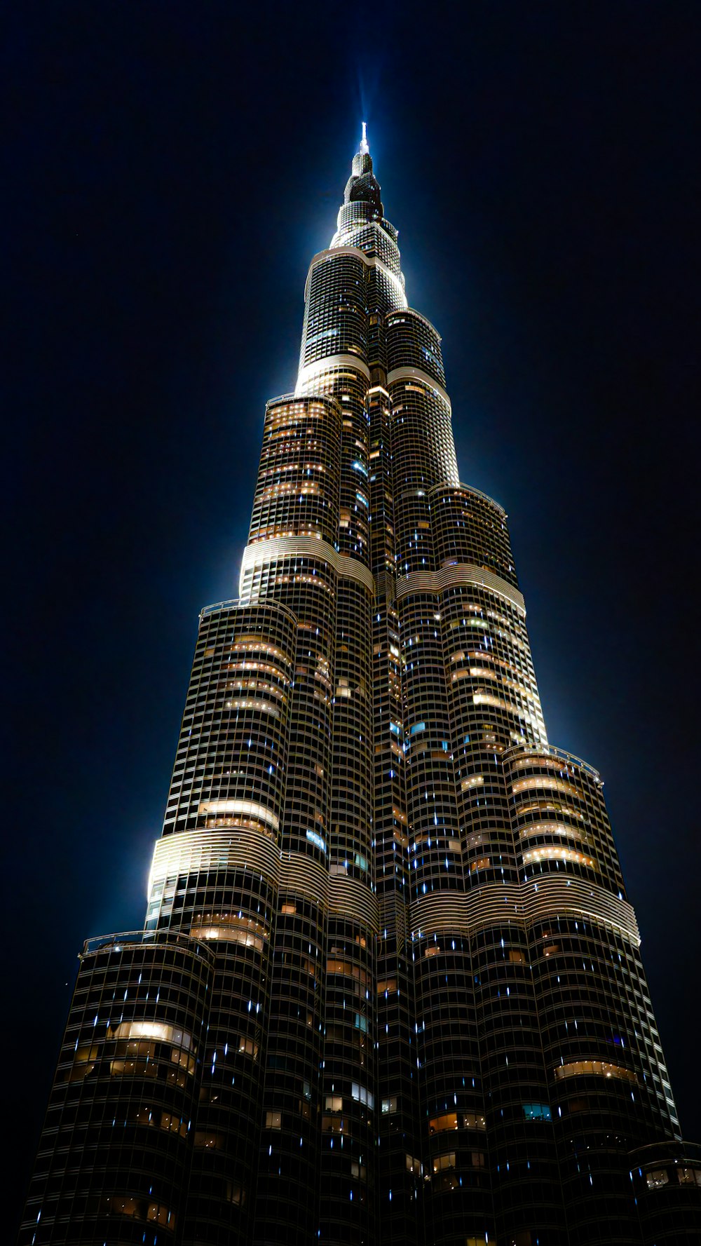 a very tall building lit up at night