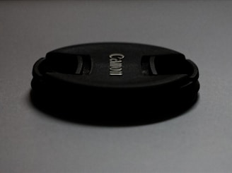 a close up of a black object on a table