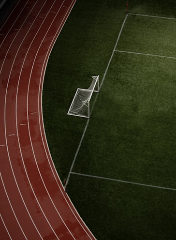 an overhead view of a soccer goal on a soccer field