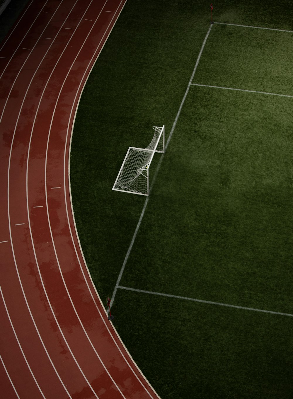 an overhead view of a soccer goal on a soccer field