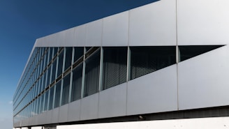 a large white building with many windows on it