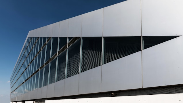 a large white building with many windows on it