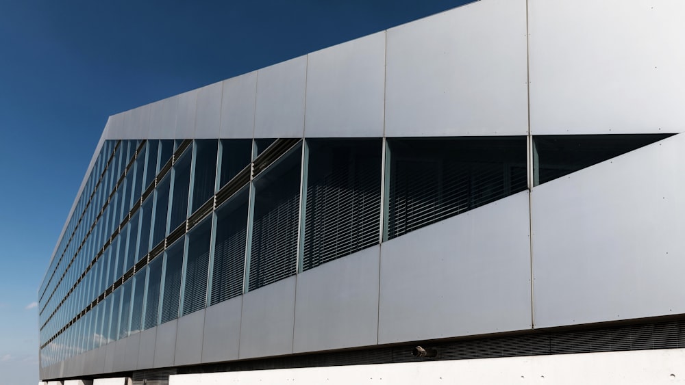 a large white building with many windows on it