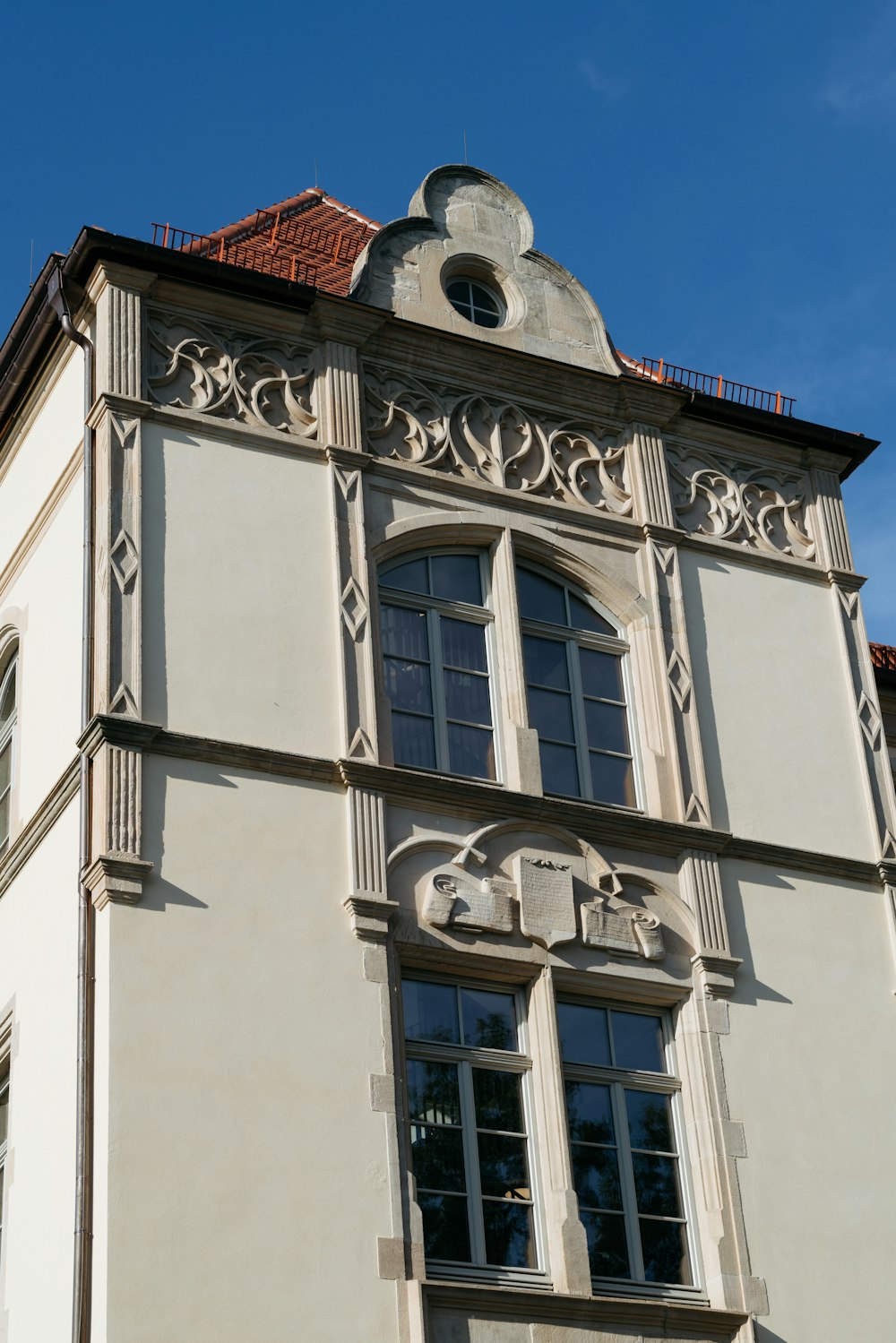 a tall building with a clock on the top of it