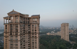 a tall building with a clock on the top of it
