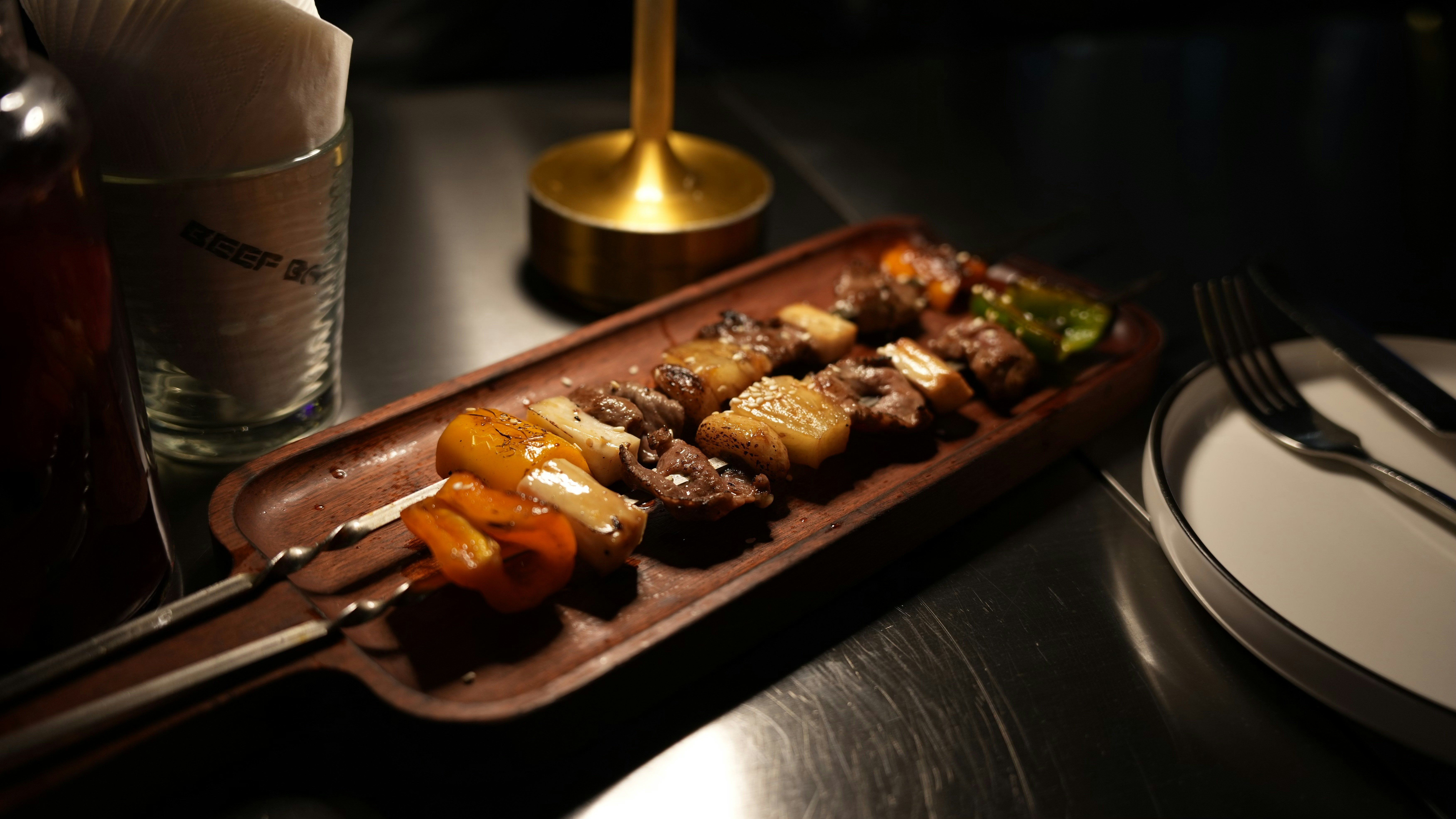 a plate of food on a table with a fork and knife