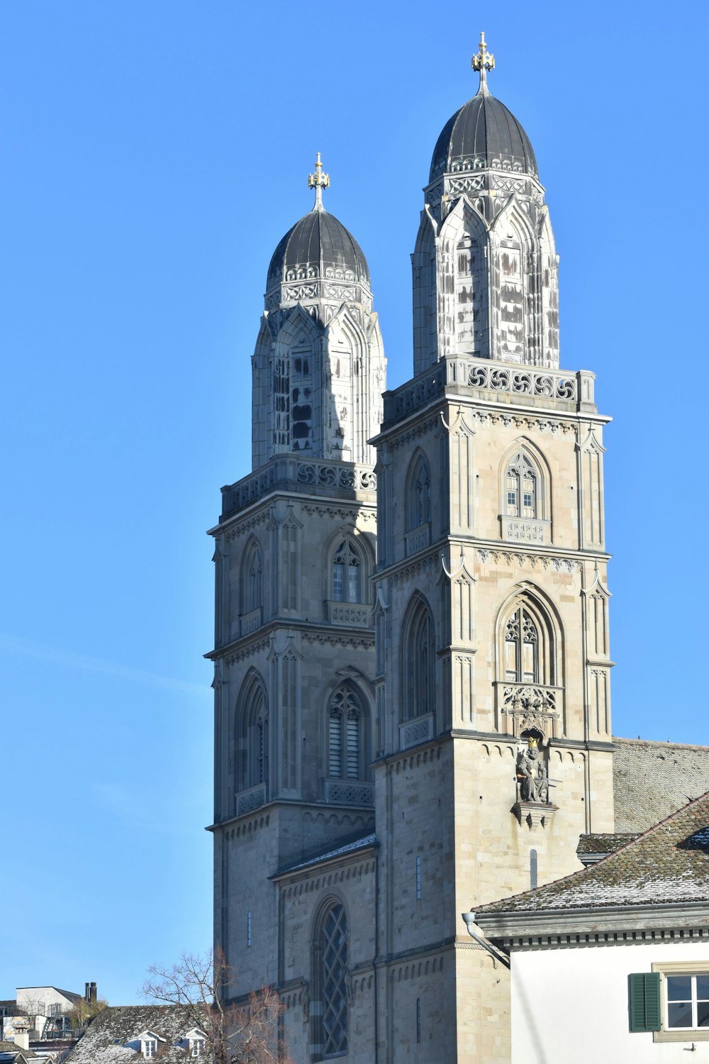 a large cathedral with two towers on a clear day