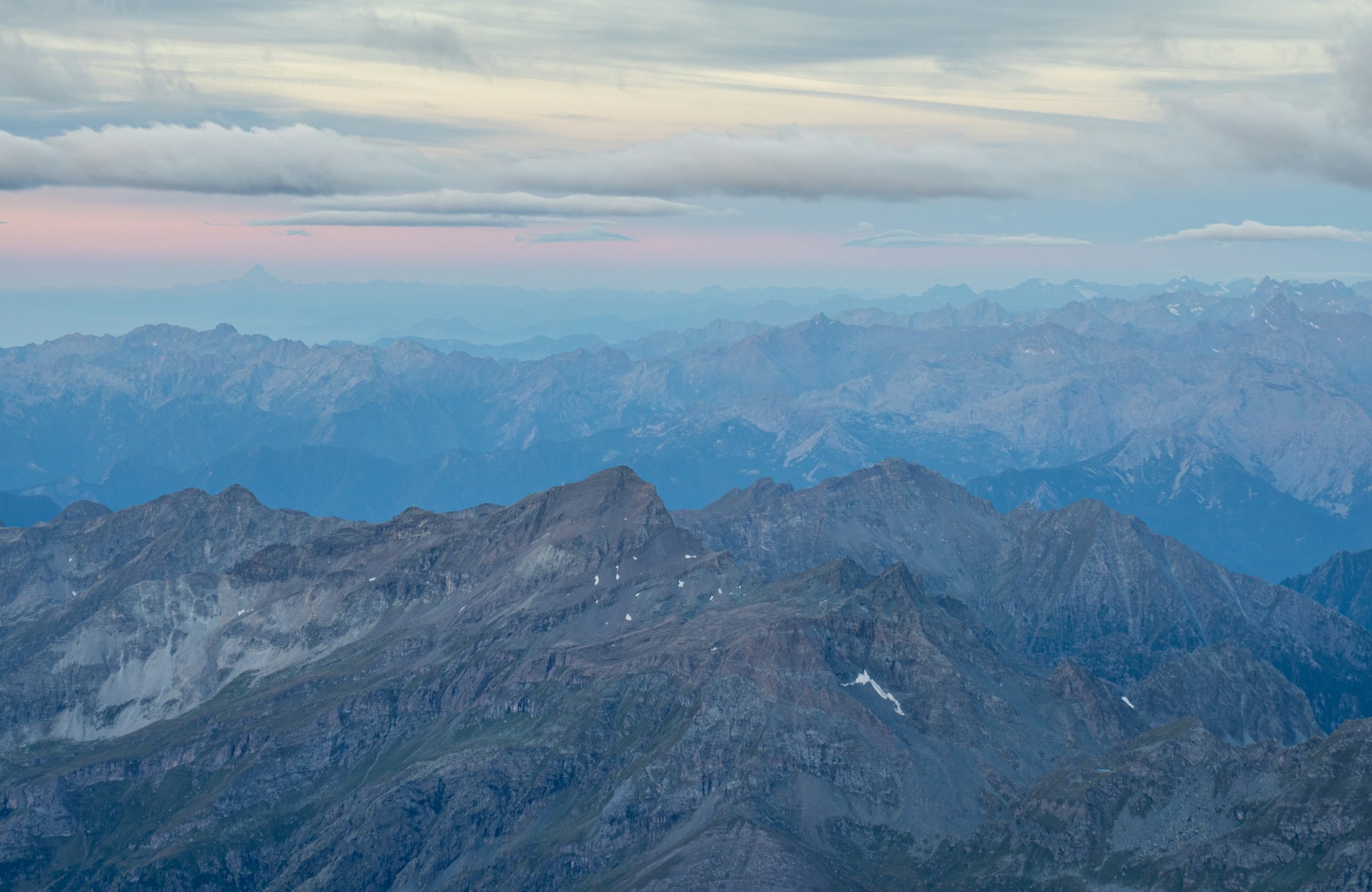 a view of a mountain range from an airplane