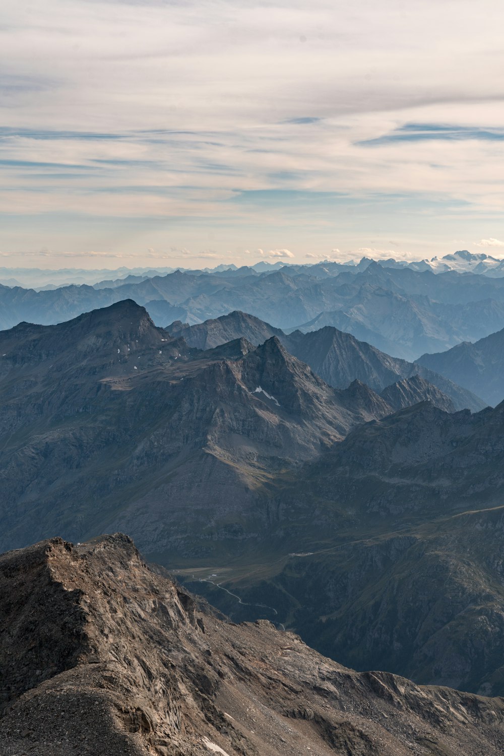 a view of mountains from the top of a mountain