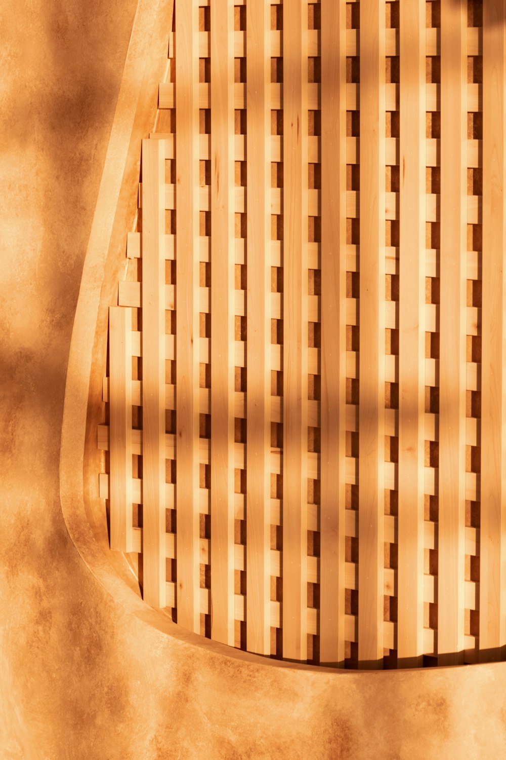 a close up of a bench made out of wood