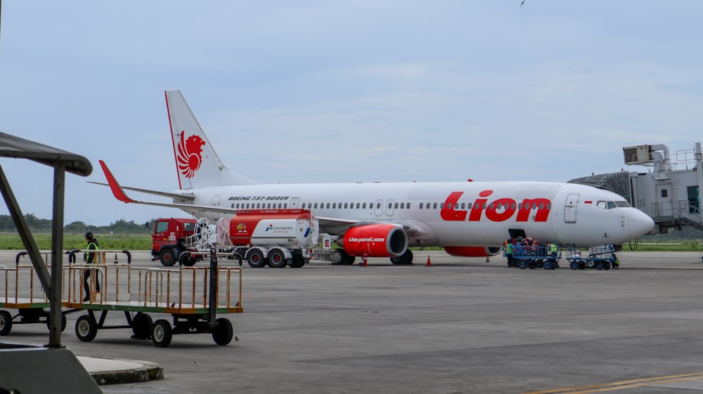 a large jetliner sitting on top of an airport tarmac