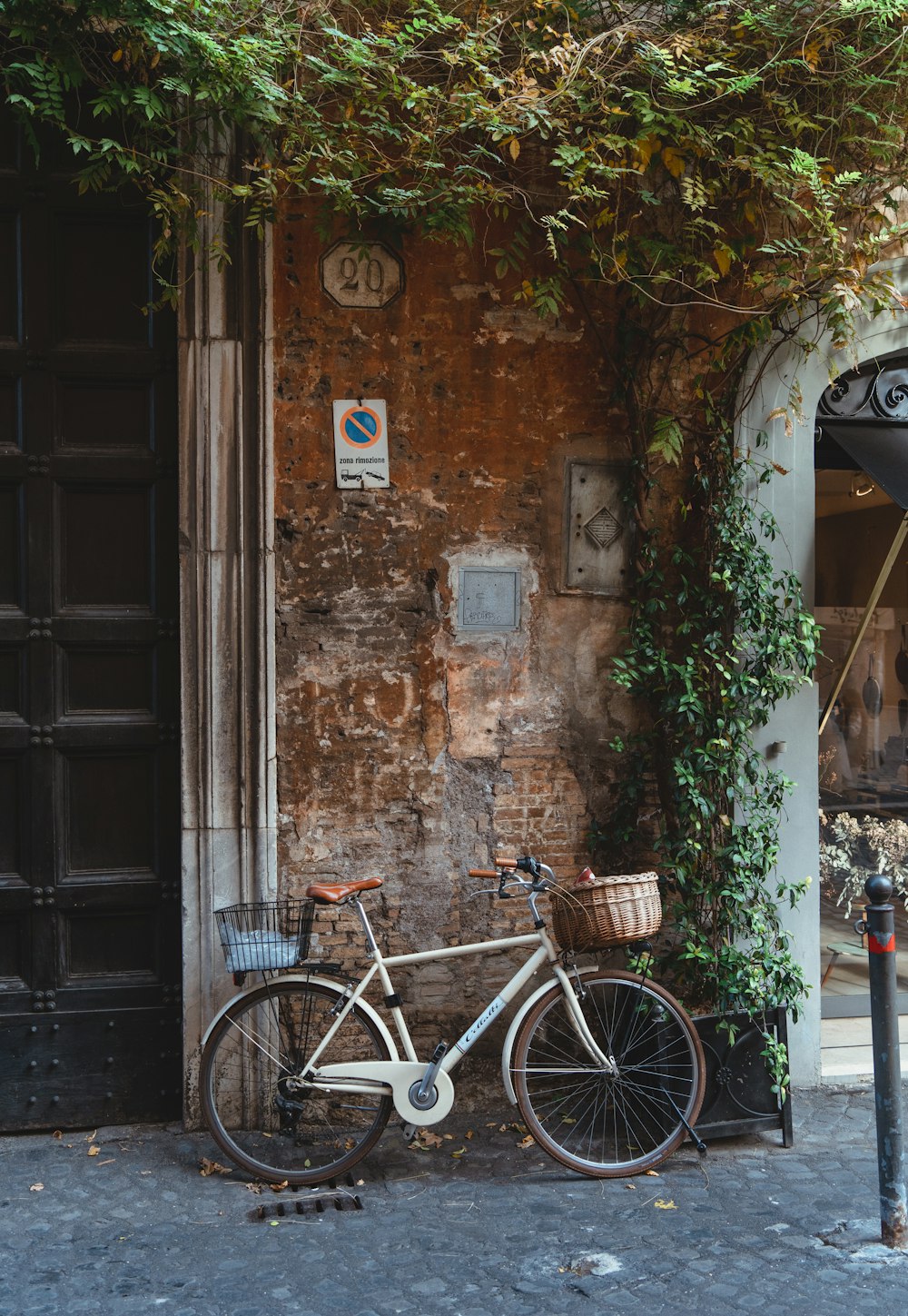 a bicycle parked in front of a building