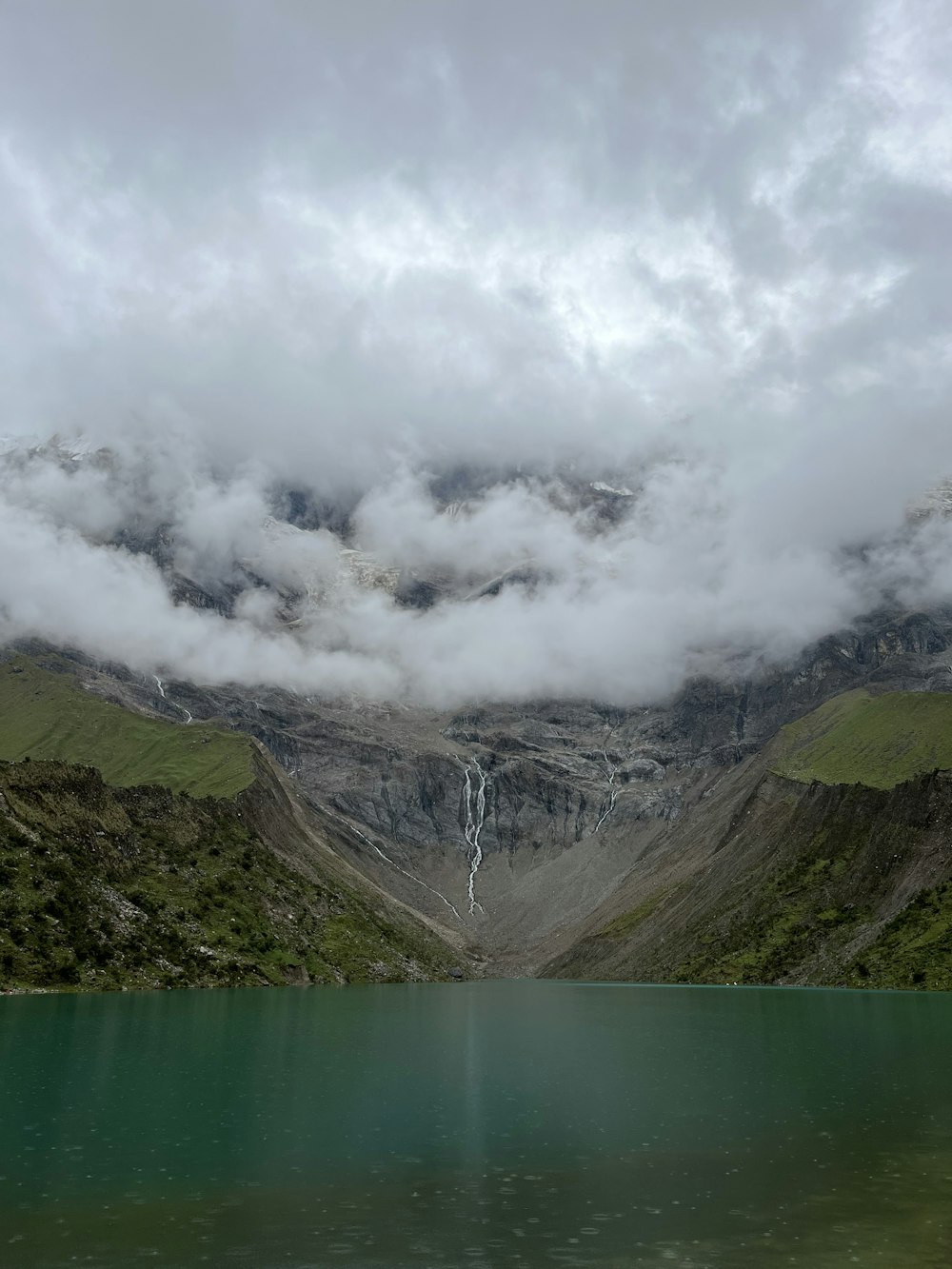 a large body of water surrounded by mountains