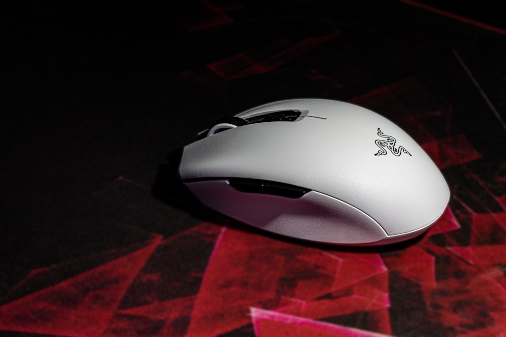 a close up of a computer mouse on a surface