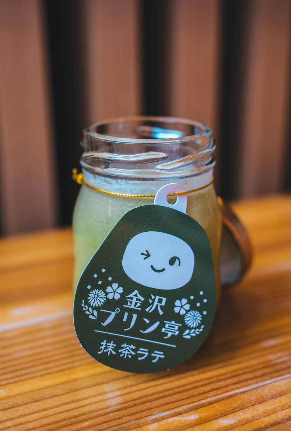 a jar with a label on it sitting on a table