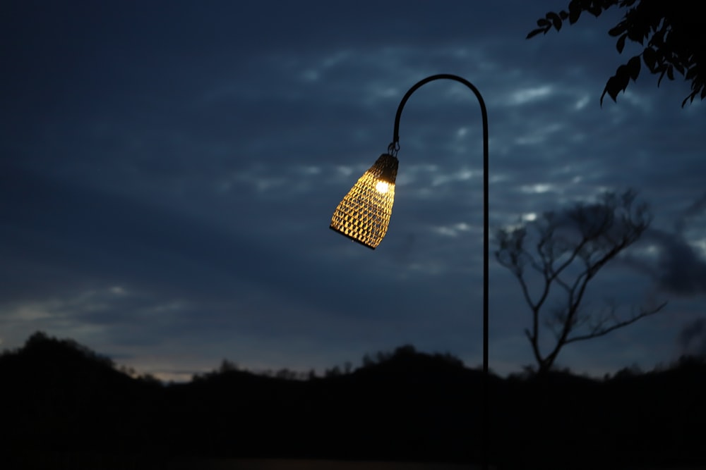 a street light that is lit up at night