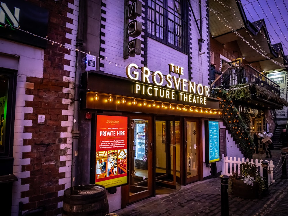 a building with a sign that says the grosvendor picture theatre