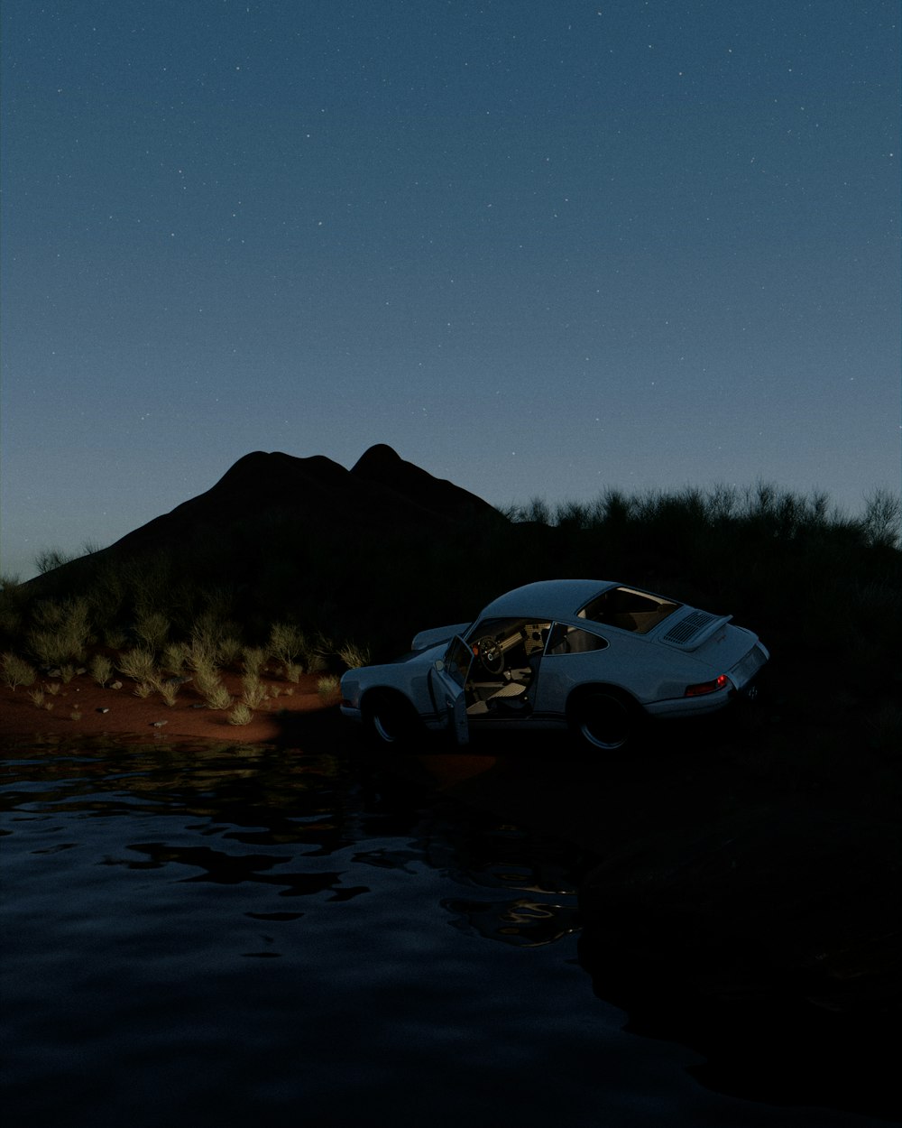 a car parked on the side of a body of water