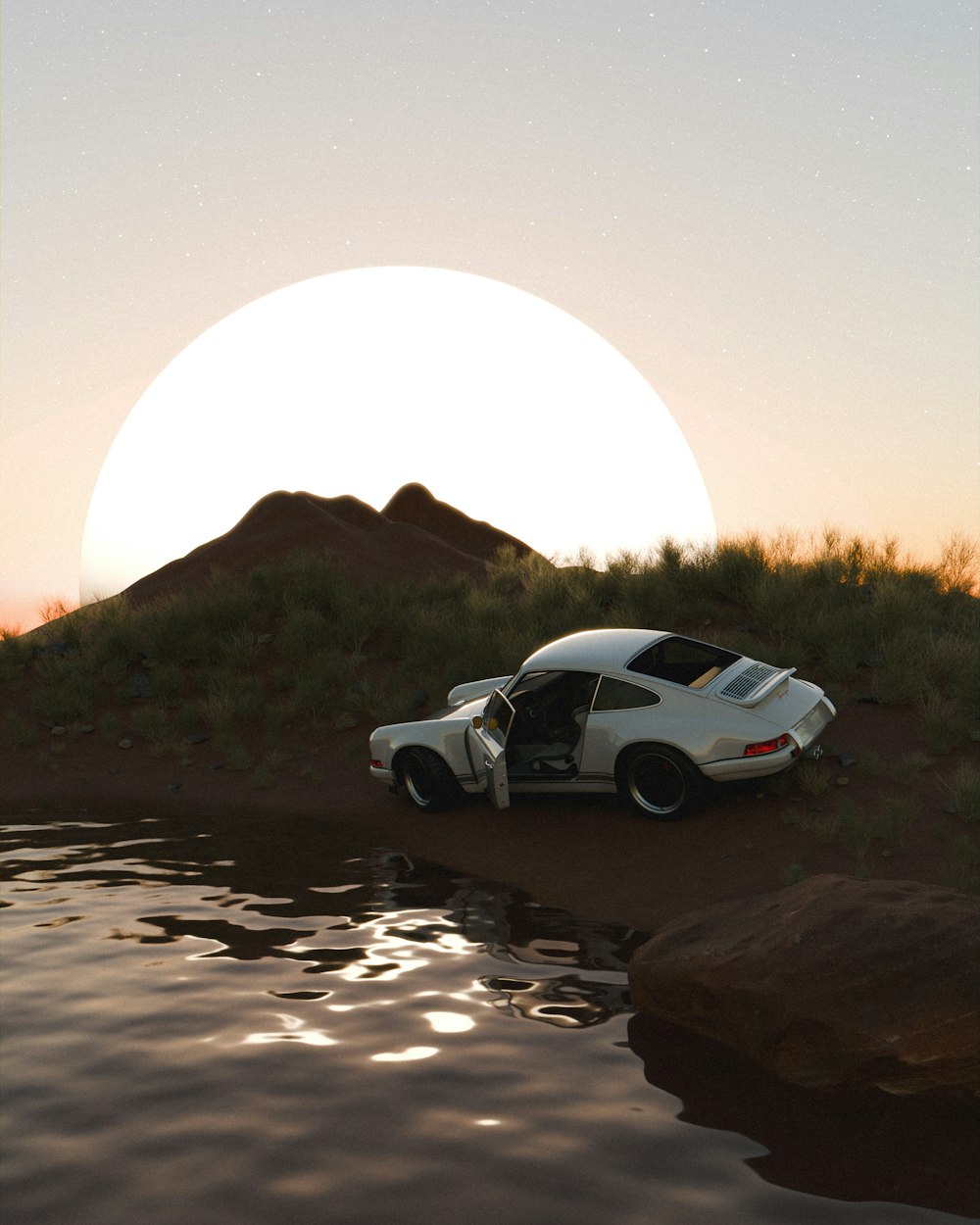 a white car parked on the side of a river