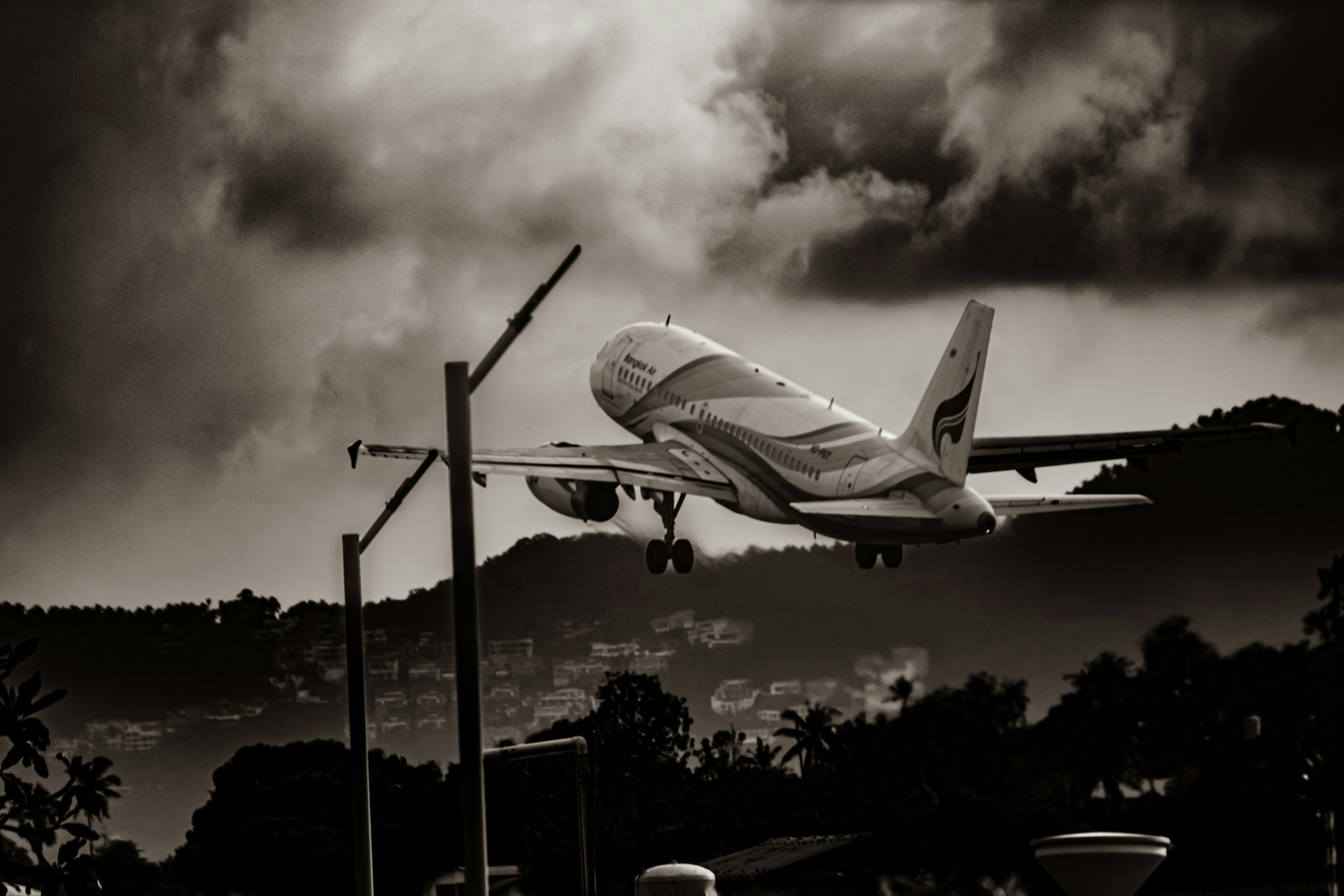 a plane taking off from an airport runway, Take off