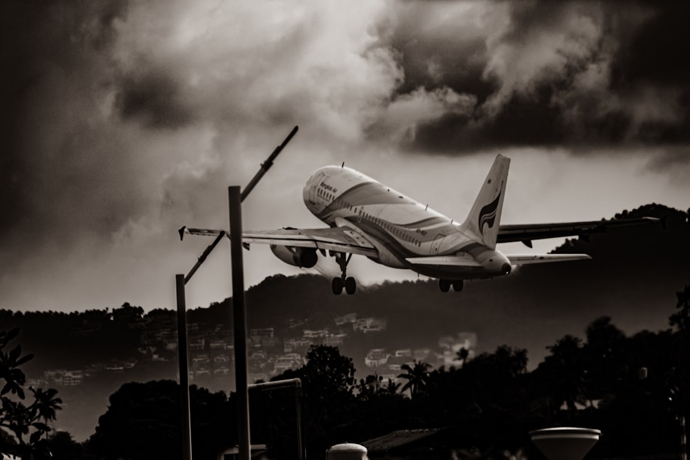 a plane taking off from an airport runway