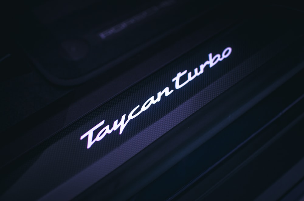 a close up of a car door with the word toyota on it