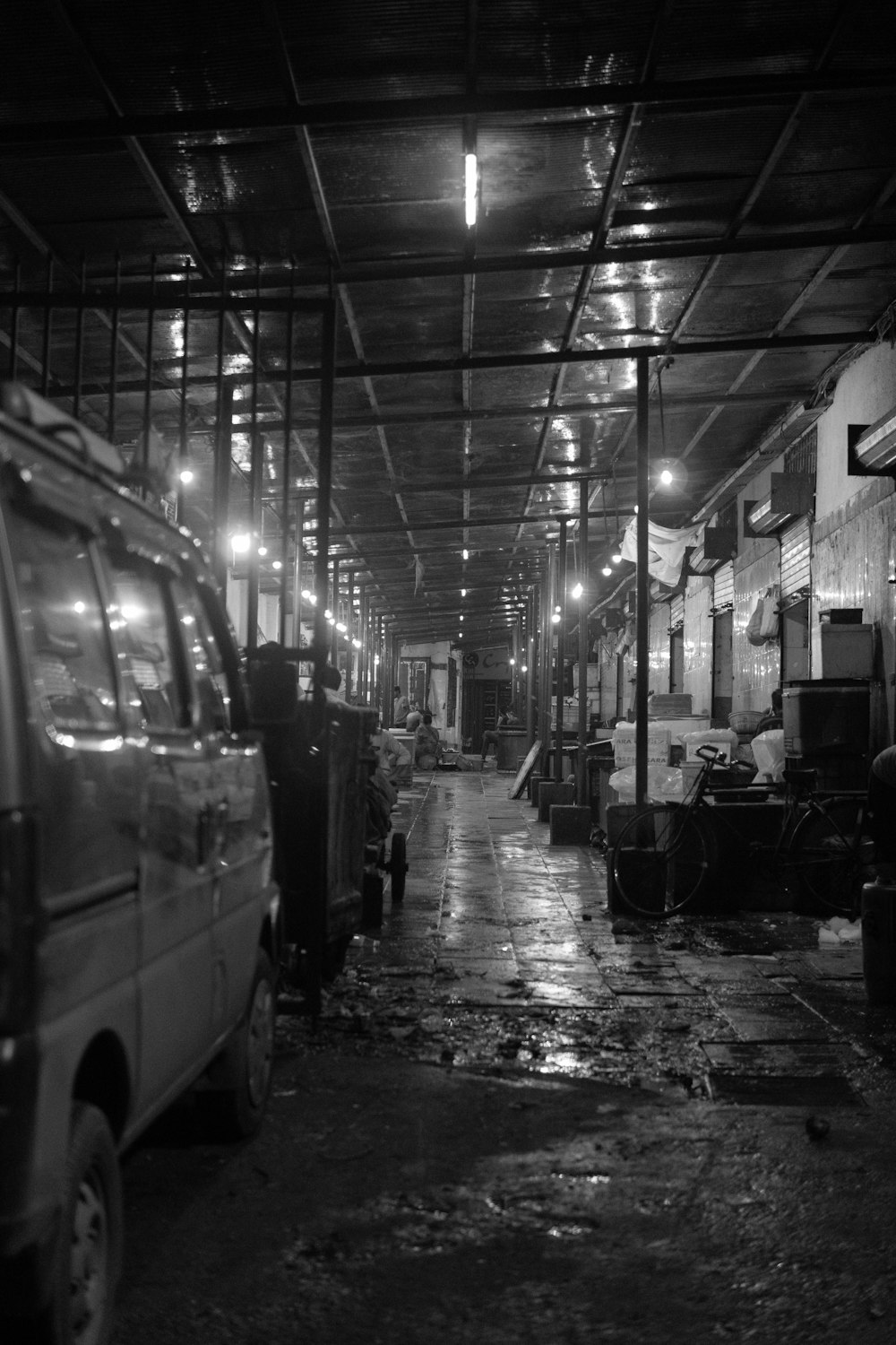 a black and white photo of a warehouse