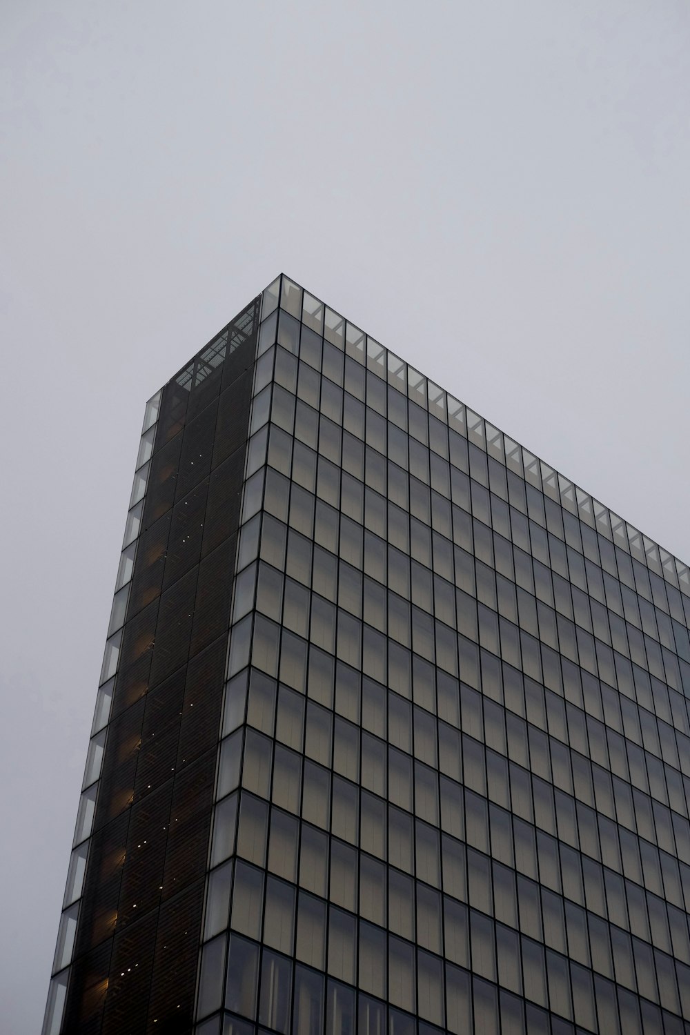 a very tall building with a clock on it's side