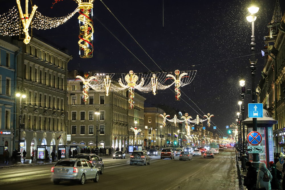 a city street with christmas lights and decorations