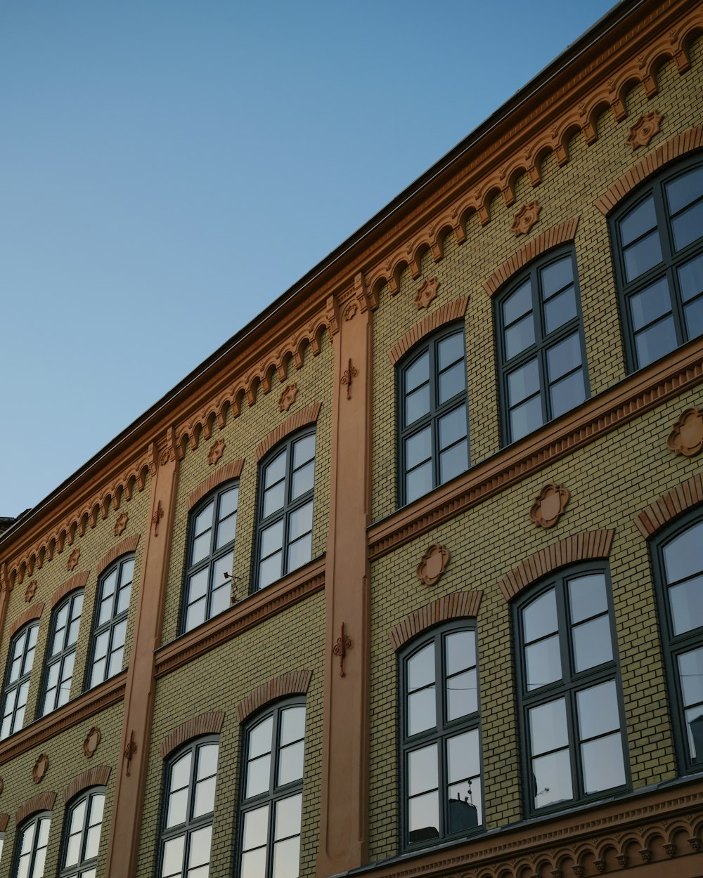 a building with a clock on the side of it