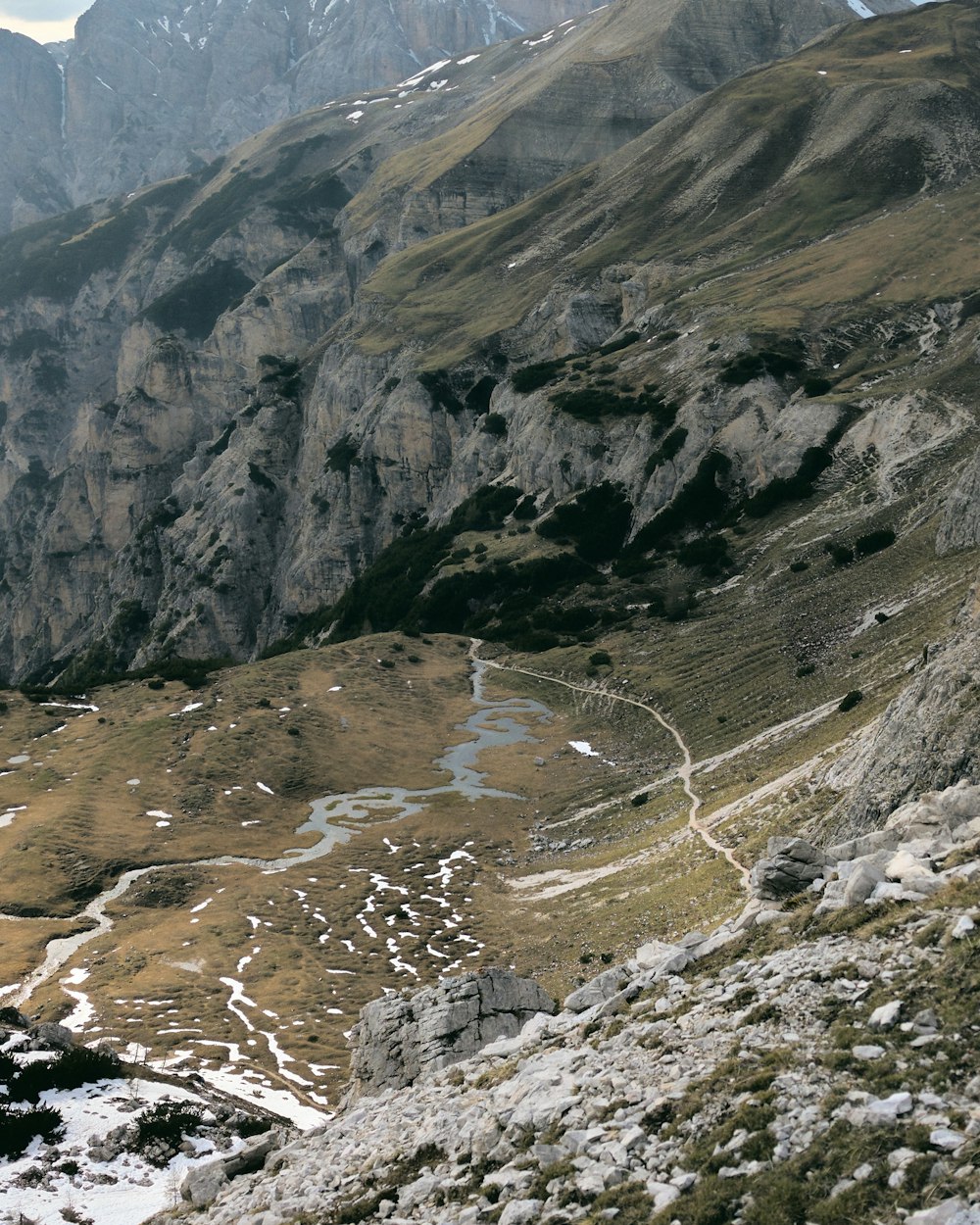 a view of a mountain with a winding road