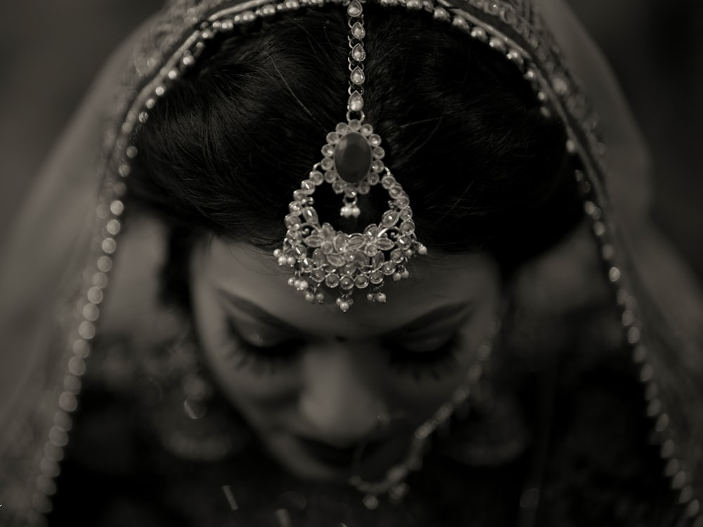 a black and white photo of a bride