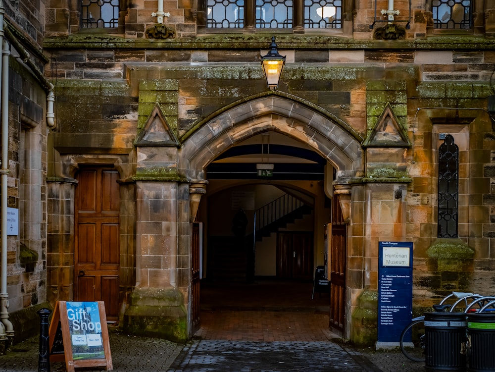 an old building with a sign in front of it