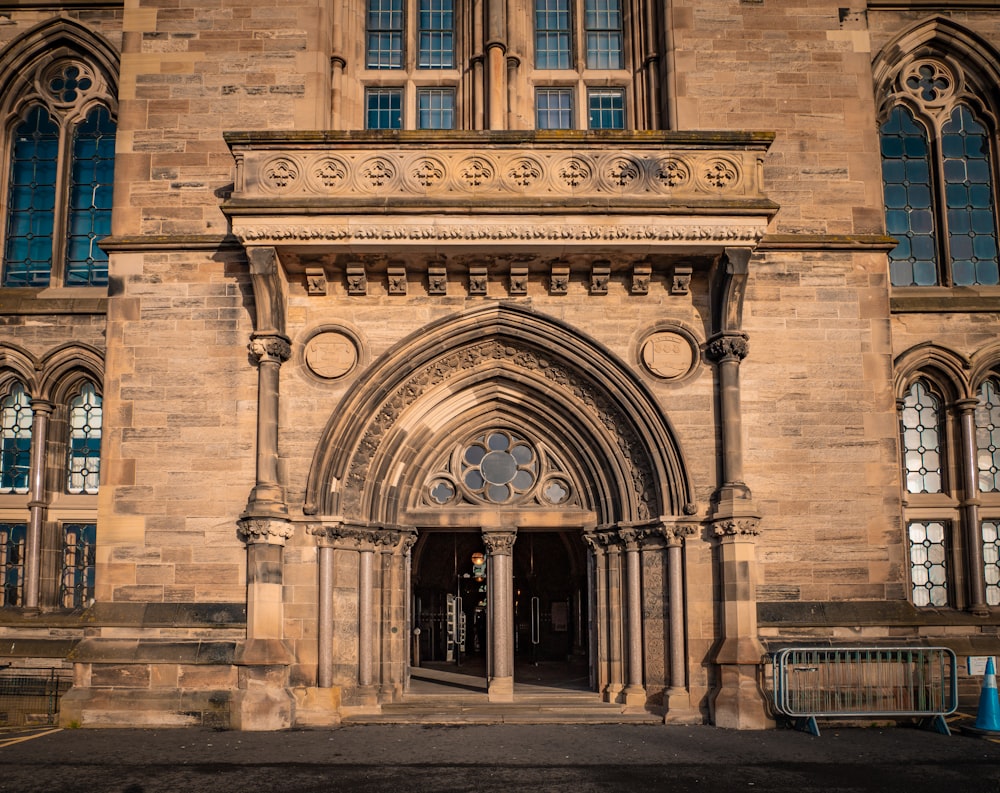 a large stone building with a large arched doorway