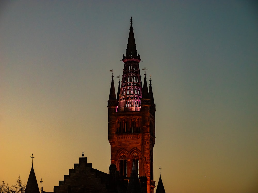 a tall tower with a clock at the top of it