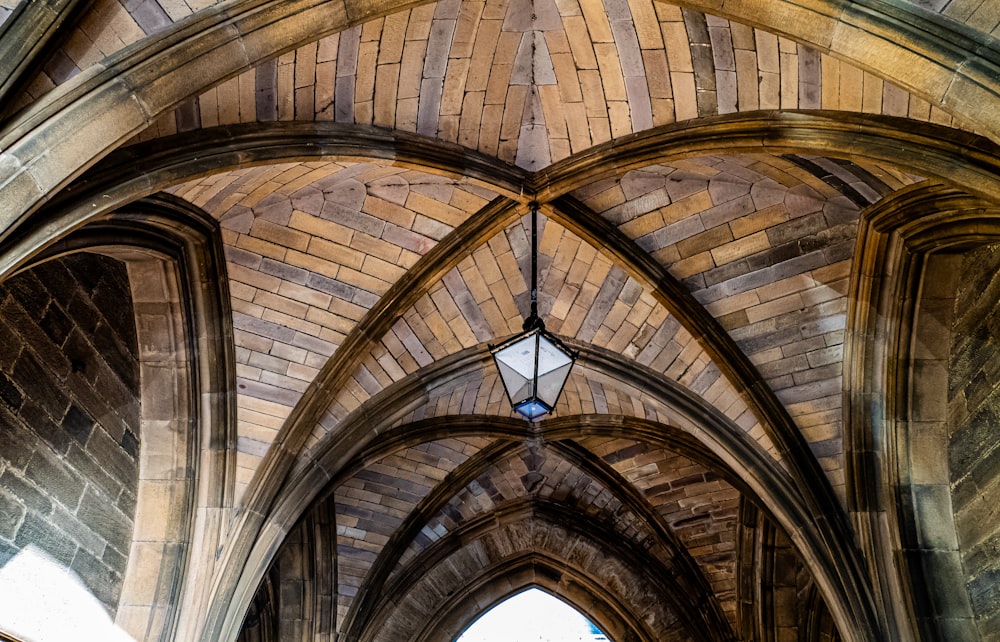 a cathedral with a light hanging from the ceiling