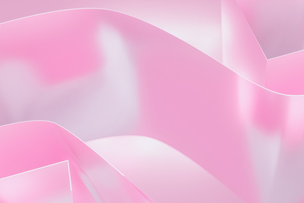 a close up of a pink abstract background