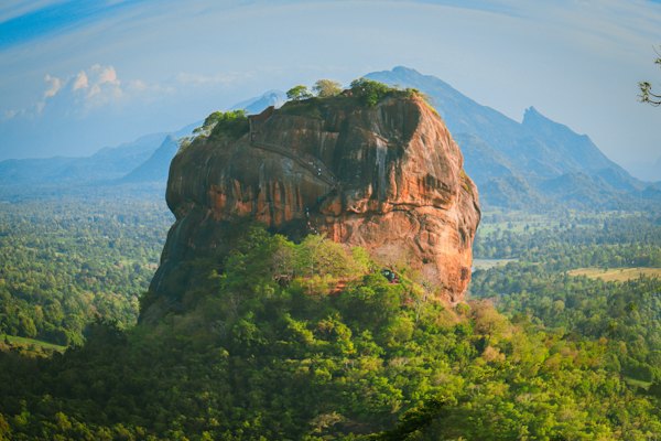 A large rock in the middle of a forest — Sigiriya & Dambulla, Sri Lanka