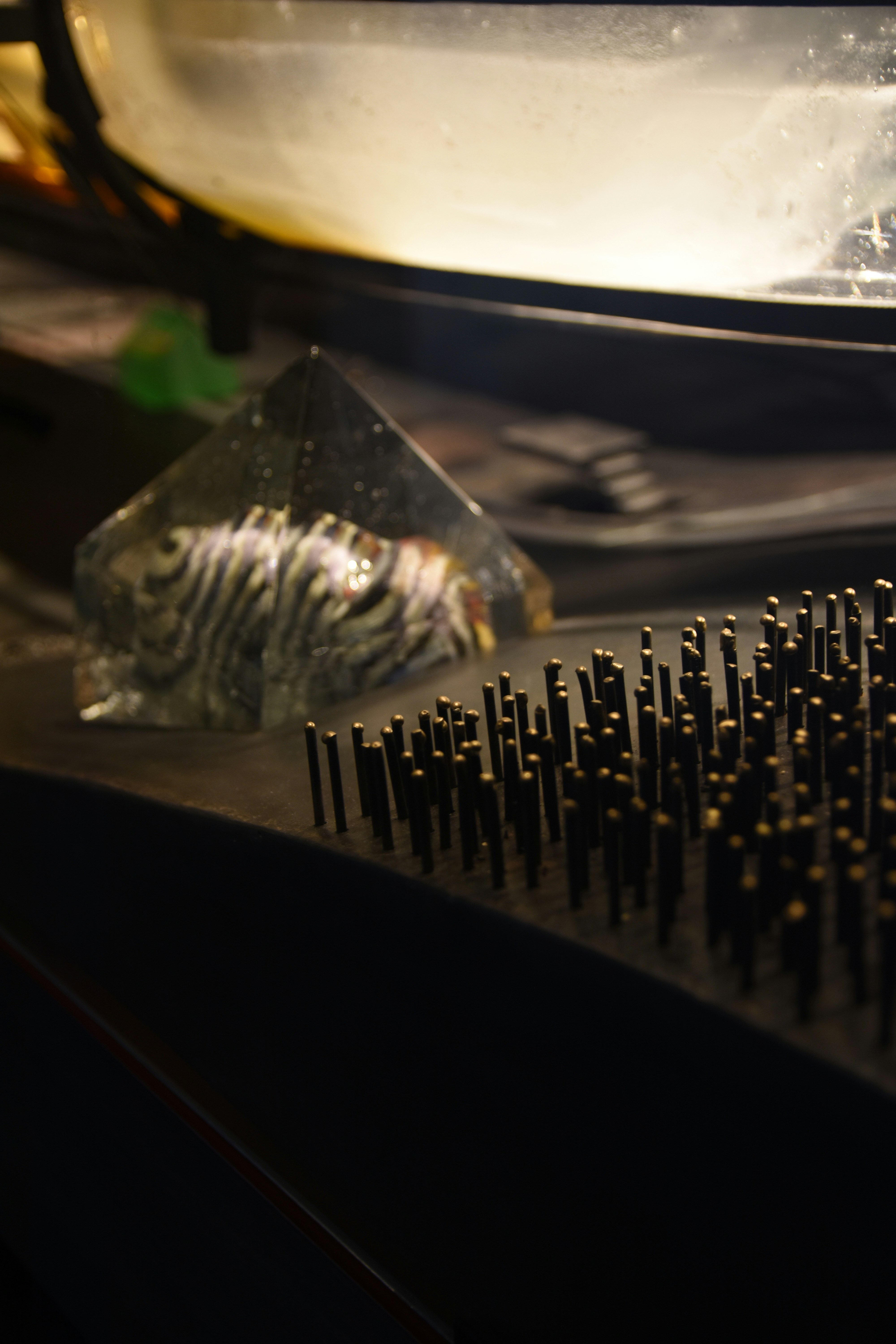 a close up of a hair brush on a table