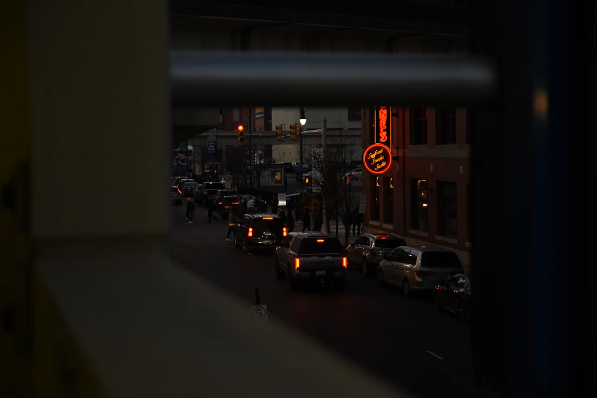 Traffic and streetlights on a Detroit street at night