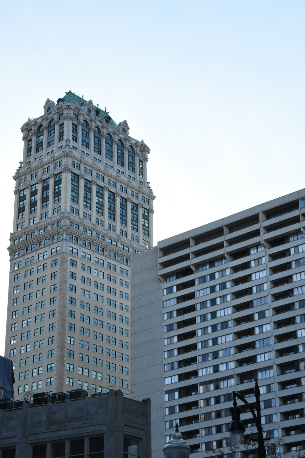 a very tall building sitting next to a traffic light