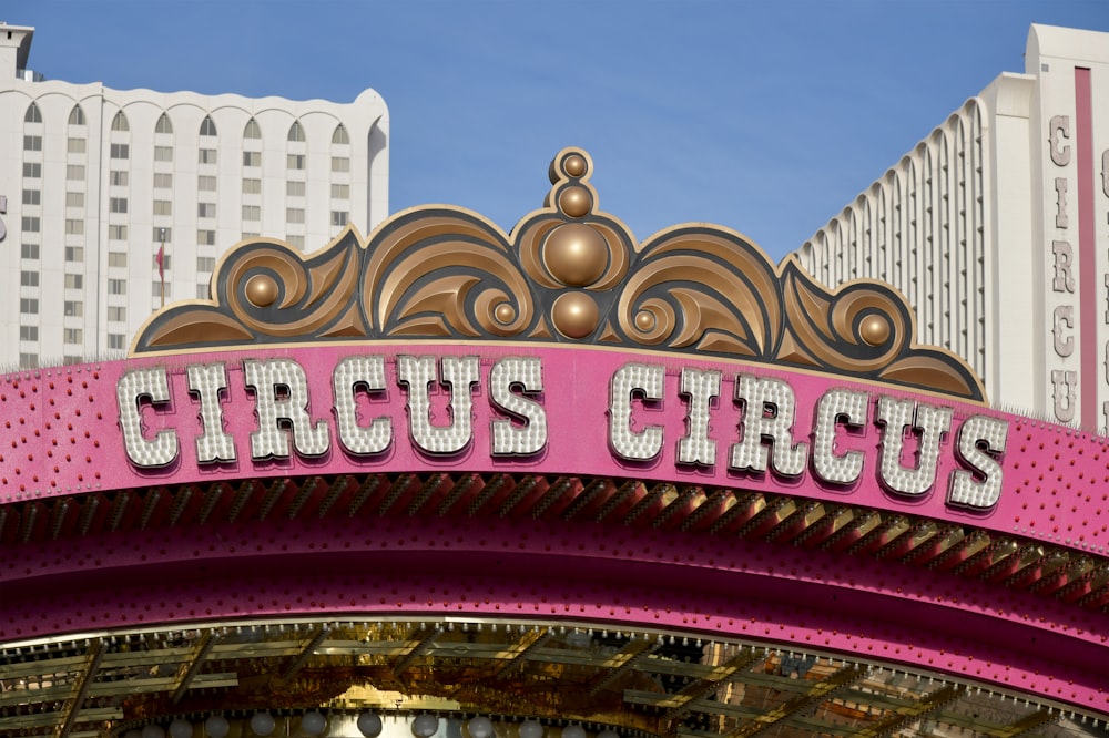 a sign that says circus circus on top of a building