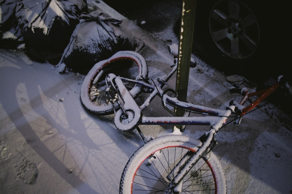 a bike that is sitting in the snow