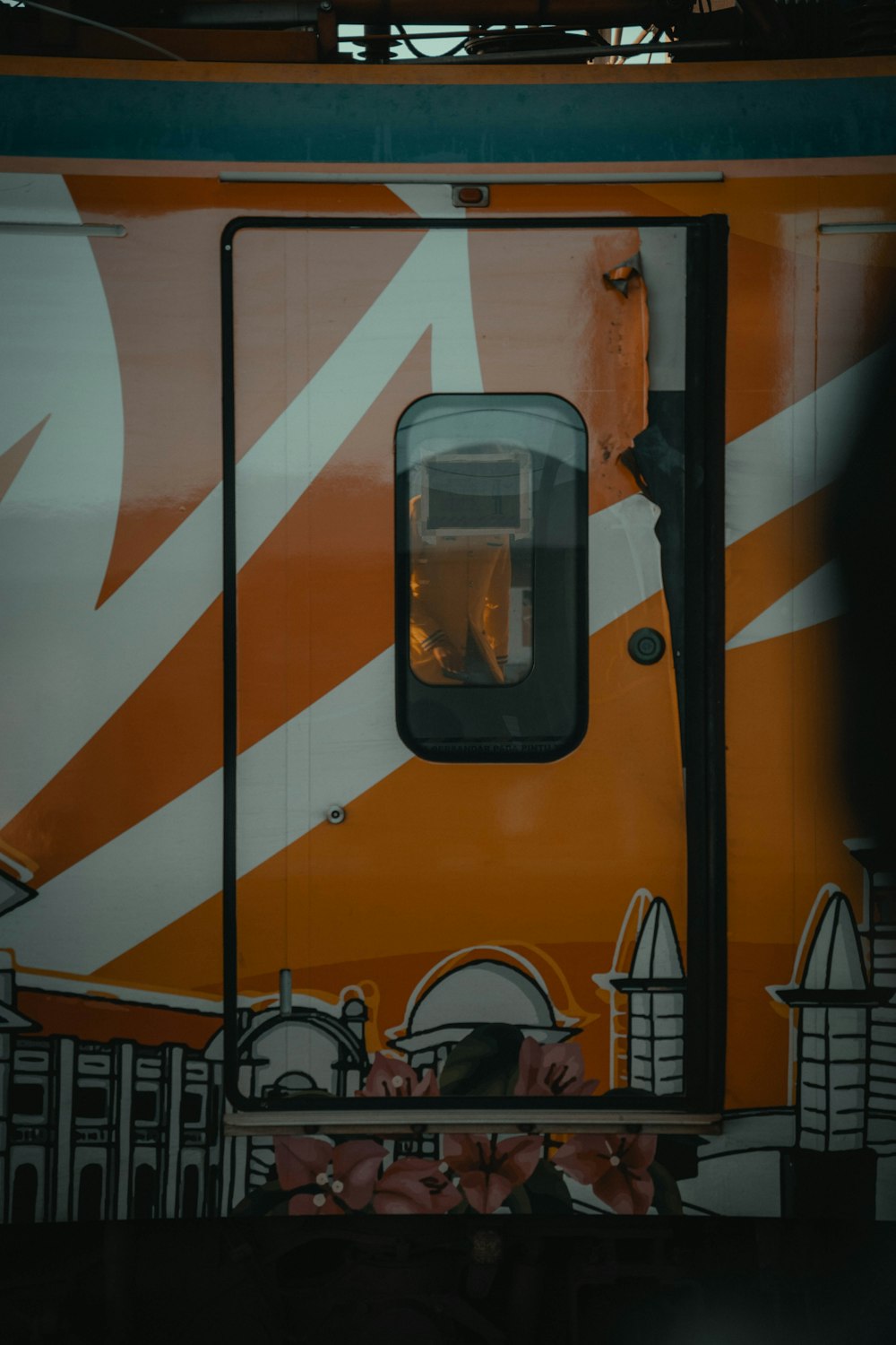 a close up of a train with graffiti on it