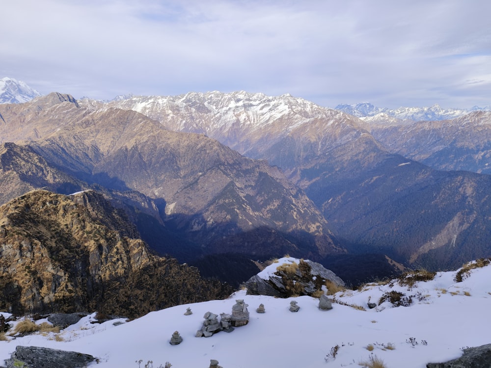 a view of a mountain range covered in snow