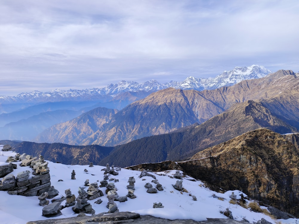 a view of a mountain range covered in snow