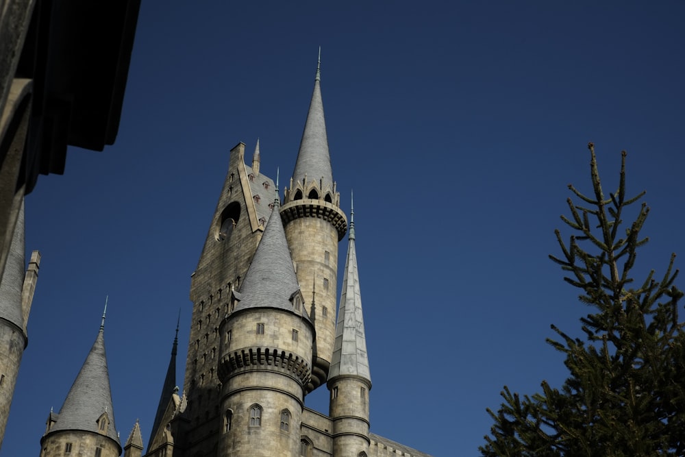 a castle with a clock on the front of it