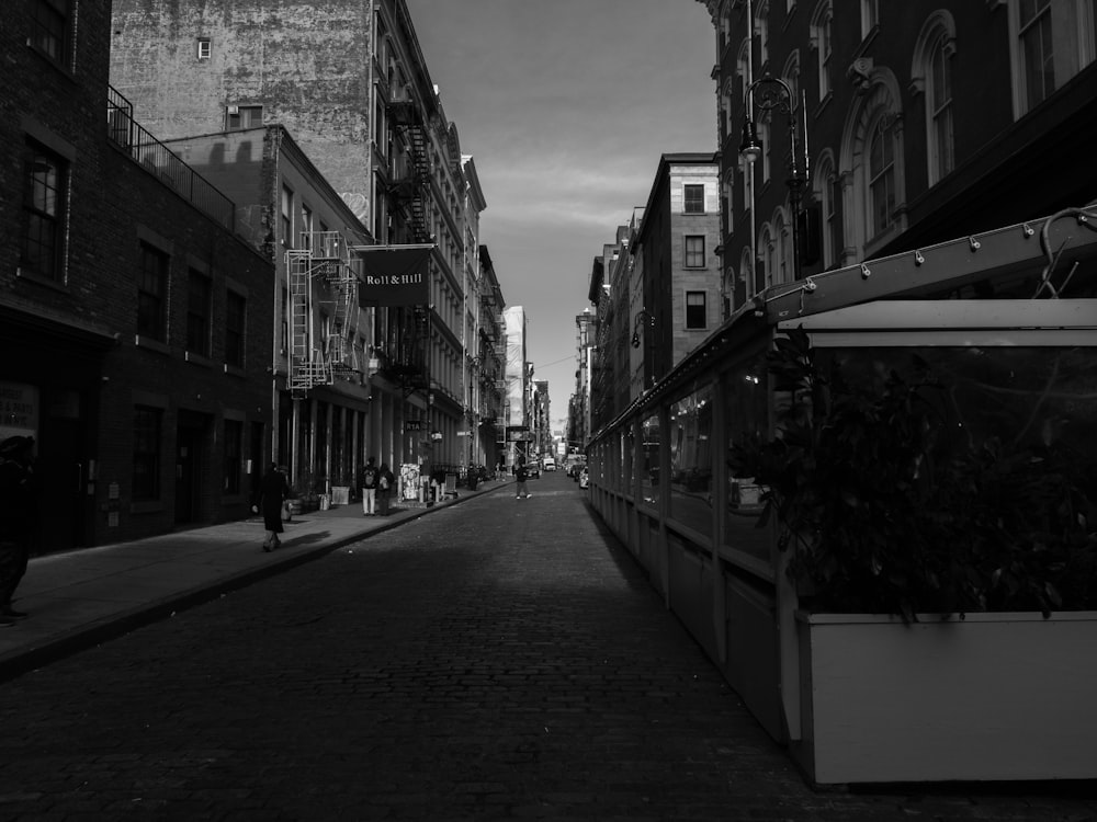 a black and white photo of a city street