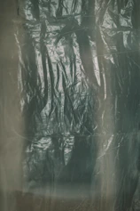 a black and white photo of a curtain
