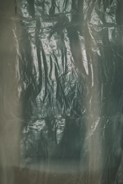a black and white photo of a curtain